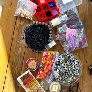 Bundle of beads, charms, sequins, glitter for art and crafts